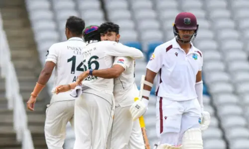 Pakistan keep West Indies in check on rain-hit opening day
