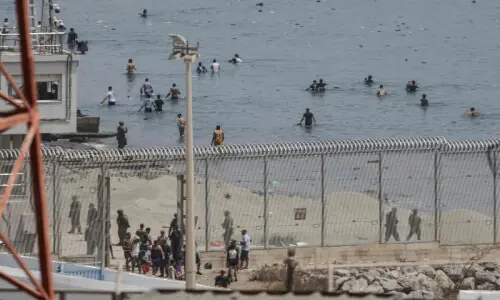 EU races to contain new migrant crisis as thousands cross into Spain's N. Africa enclave