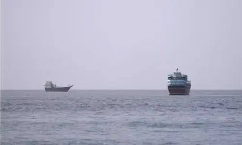 Cargo vessel hit by unidentified projectile off Oman's coast