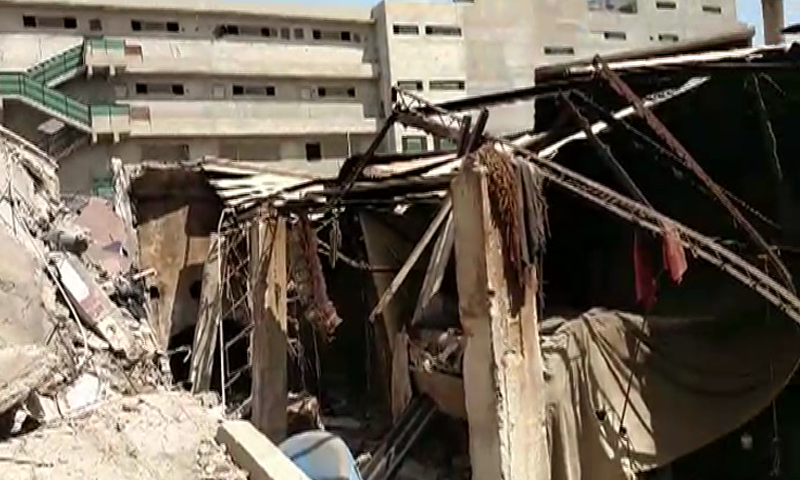 At least 4 injured, many feared trapped as a factory collapses in Karachi