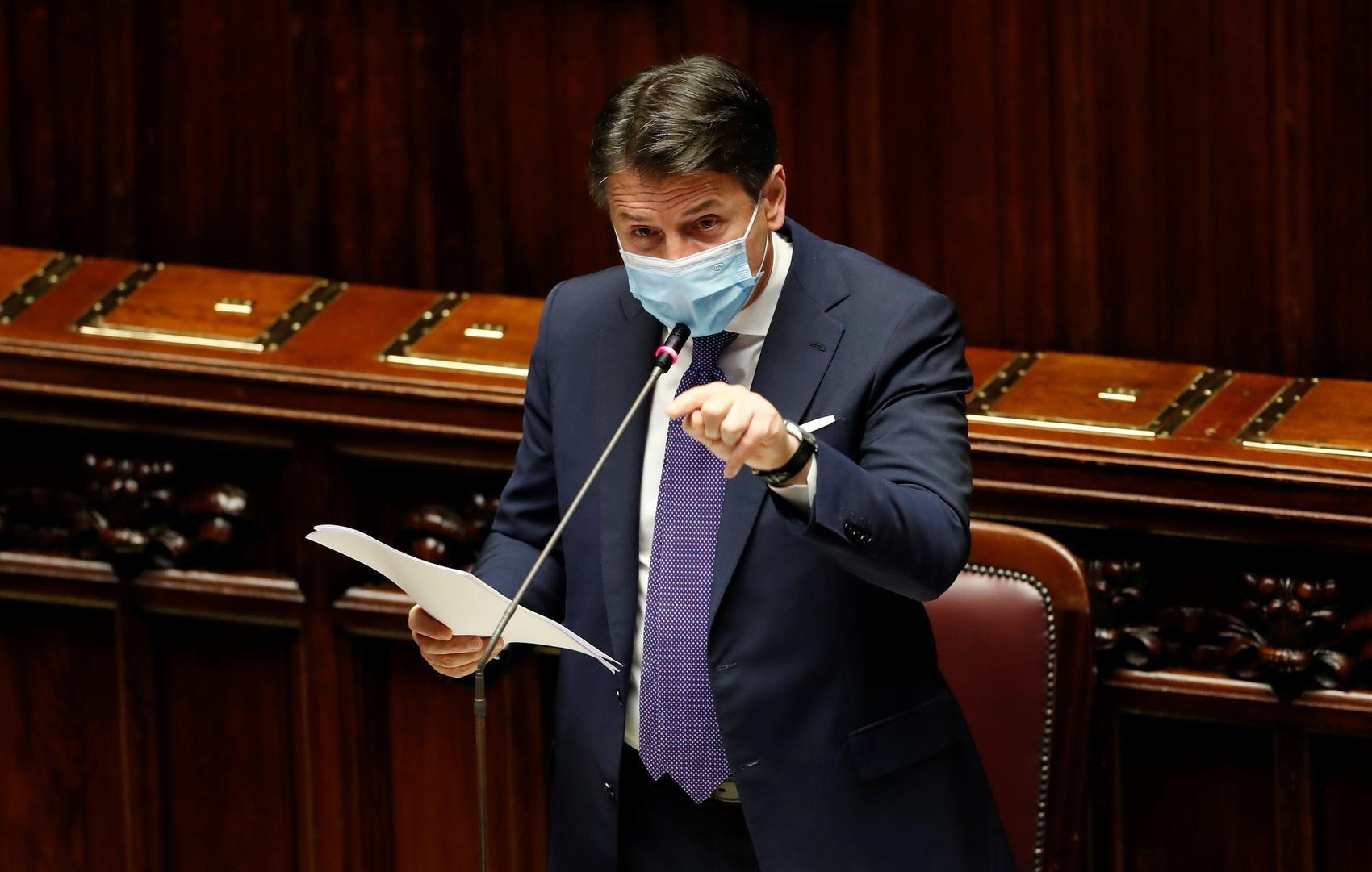 Italy to tighten COVID curbs, but holds back from lockdown