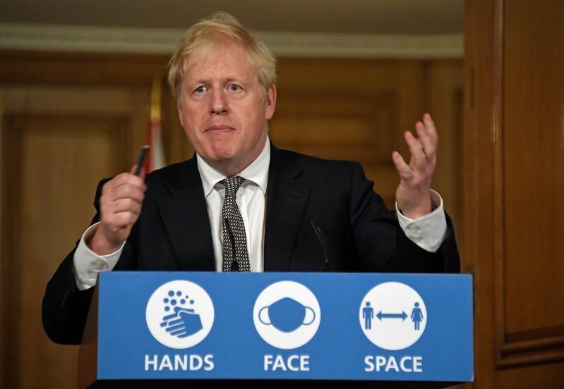 Johnson defends lockdown to avoid "medical and moral disaster"