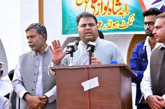 The federal minister was addressing a public meeting in Pind Dadankhan. APP