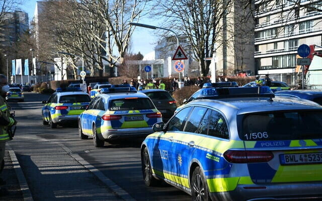 Police vehicles are parked on the grounds of Heidelberg University in Heidelberg, Germany, January 24, 2022. AP Photo