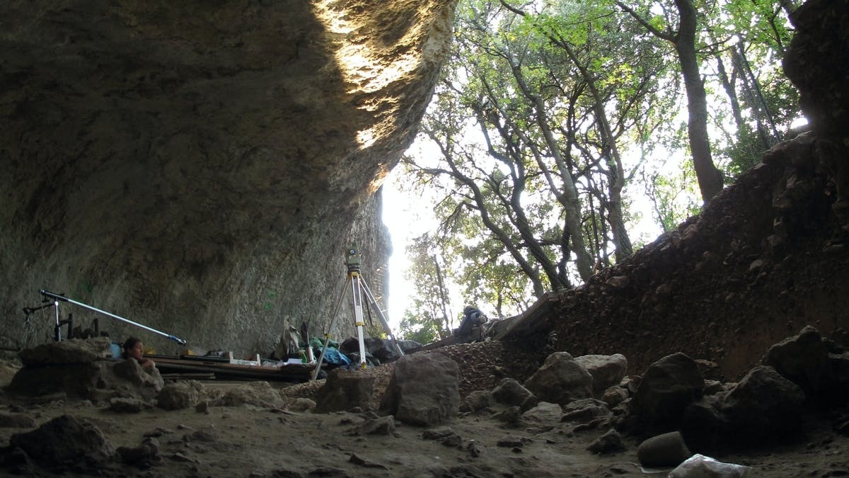 The Grotte Mandrin rock shelter saw repeated use by Neanderthals and modern humans over millennia. The Conversation