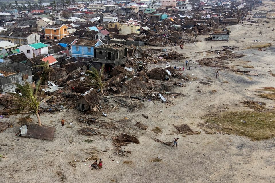 An aerial view shows damaged houses and debris on the beach, in the aftermath of Cyclone Batsirai, in Mananjary, Madagascar. Reuters