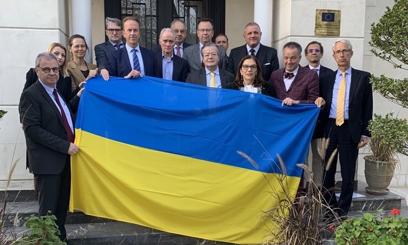 Envoys of European Union countries to Pakistan hold Ukraine's flag in solidarity to the country. Photo via Twitter/@AKaminara