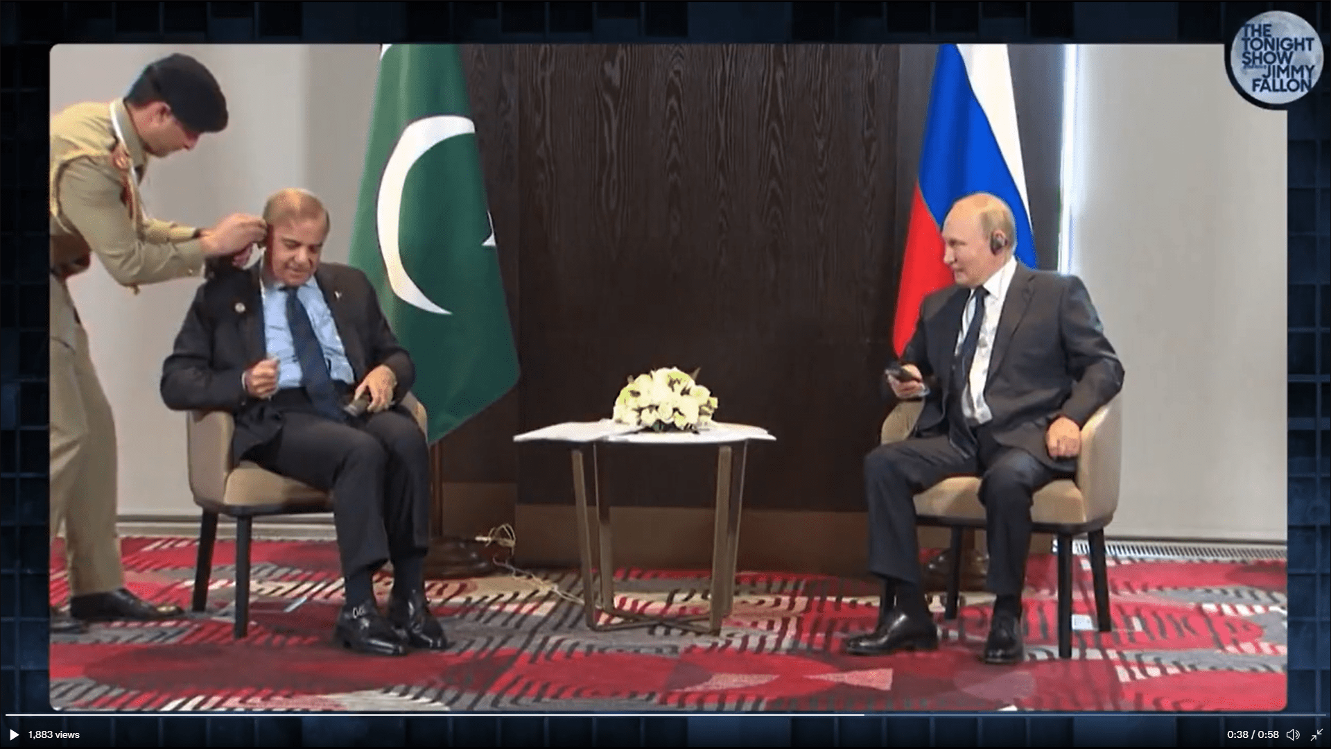 An aide helps PM Shehbaz put on translation earphones during meeting with Russian President Vladimir Putin. Screengrab The Tonight Show with Jimmy Fallon