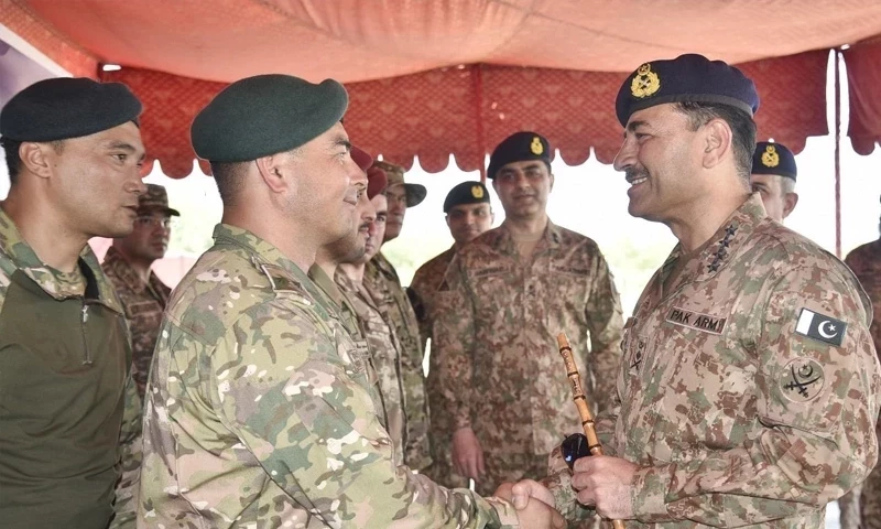 Chief of Army Staff General Asim Munir meets a participant in the Multi-National Special Forces Exercise ‘Eternal Brotherhood-II’ in Barotha. Photo via ISPR