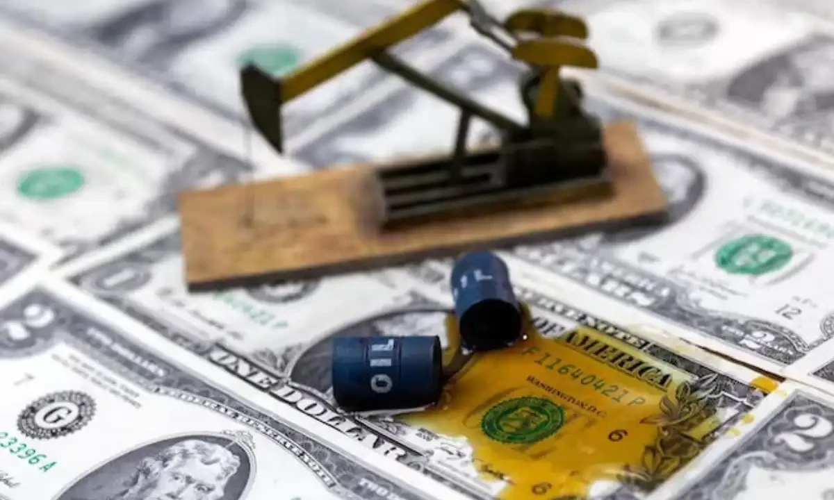 Oil, miniatures of oil barrels, oil pump jack and US dollar banknote are seen in this illustration taken on June 6, 2023. Reuters Oil, miniatures of oil barrels, oil pump jack and US dollar banknote are seen in this illustration taken on June 6, 2023. Reuters