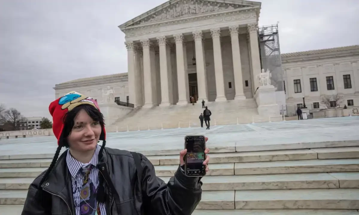 A woman shows her TikTok feed in front of the US Supreme Court in Washington, US on January 17, 2025. Reuters A woman shows her TikTok feed in front of the US Supreme Court in Washington, US on January 17, 2025. Reuters