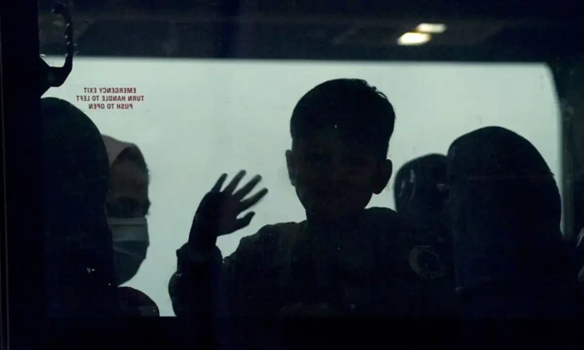 A day after US forces completed their troop withdrawal from Afghanistan, an Afghan boy waves from a bus taking refugees to a processing center upon their arrival at Dulles International Airport in Dulles, Virginia, US on September 1, 2021. Reuters A day after US forces completed their troop withdrawal from Afghanistan, an Afghan boy waves from a bus taking refugees to a processing center upon their arrival at Dulles International Airport in Dulles, Virginia, US on September 1, 2021. Reuters