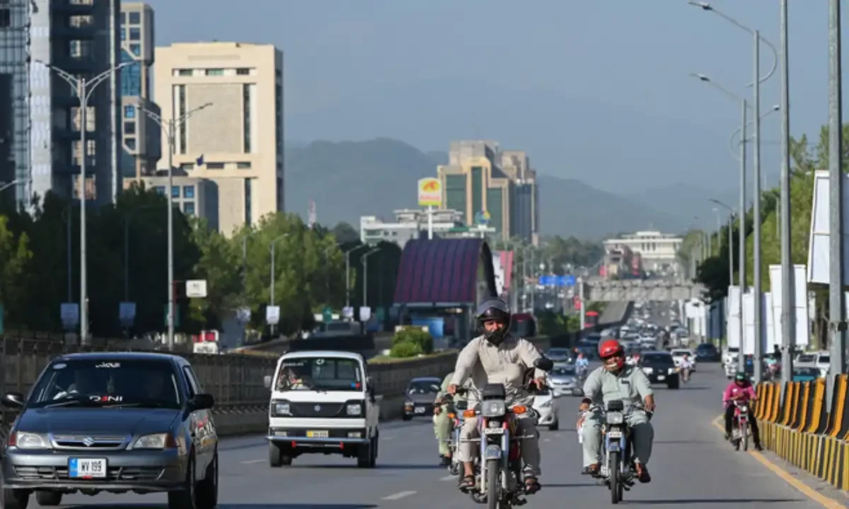 People commute on a road in Islamabad on July 11, 2023. AFP/File People commute on a road in Islamabad on July 11, 2023. AFP/File