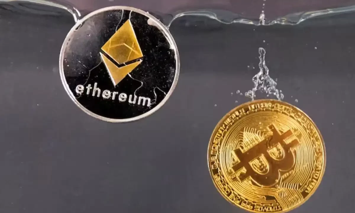 Souvenir tokens representing cryptocurrency Bitcoin and the Ethereum network, with its native token ether, plunge into water in this illustration taken May 17, 2022. Reuters file Souvenir tokens representing cryptocurrency Bitcoin and the Ethereum network, with its native token ether, plunge into water in this illustration taken May 17, 2022. Reuters file
