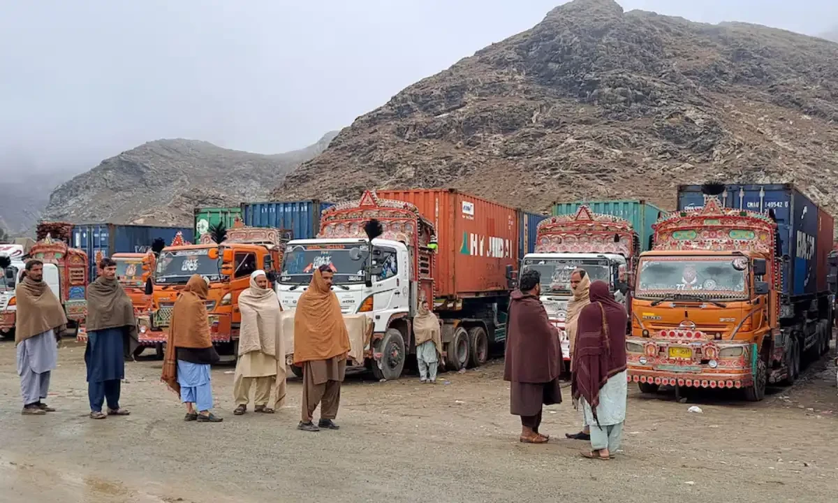 People stand next to parked trucks loaded with supplies at the Torkham border crossing following the closure of the border crossing between Pakistan and Afghanistan, March 3, 2025. Reuters People stand next to parked trucks loaded with supplies at the Torkham border crossing following the closure of the border crossing between Pakistan and Afghanistan, March 3, 2025. Reuters