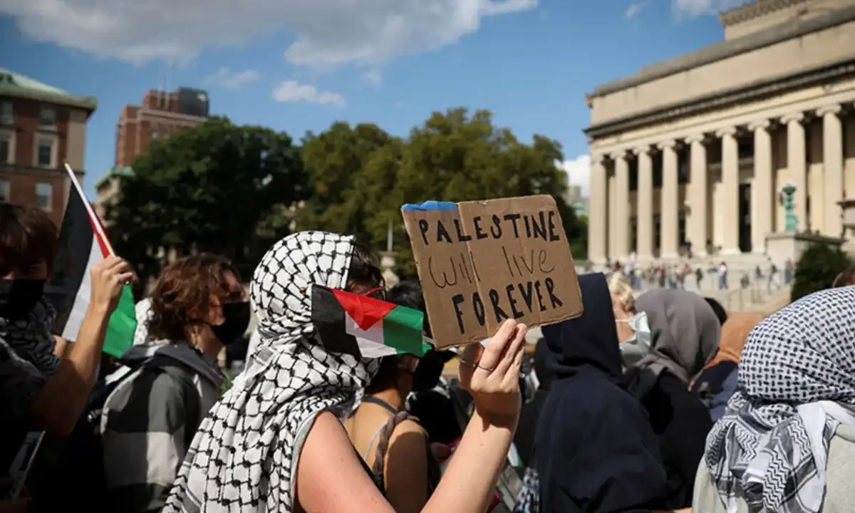 A pro-Palestinian demonstrator holds a sign that reads ‘Palestine will live forever’, on the campus of Columbia University, on the one-year anniversary of Hamas’ October 7 attack, amid the ongoing Israel-Hamas conflict, in New York City, US on October 7. Reuters/File A pro-Palestinian demonstrator holds a sign that reads ‘Palestine will live forever’, on the campus of Columbia University, on the one-year anniversary of Hamas’ October 7 attack, amid the ongoing Israel-Hamas conflict, in New York City, US on October 7. Reuters/File