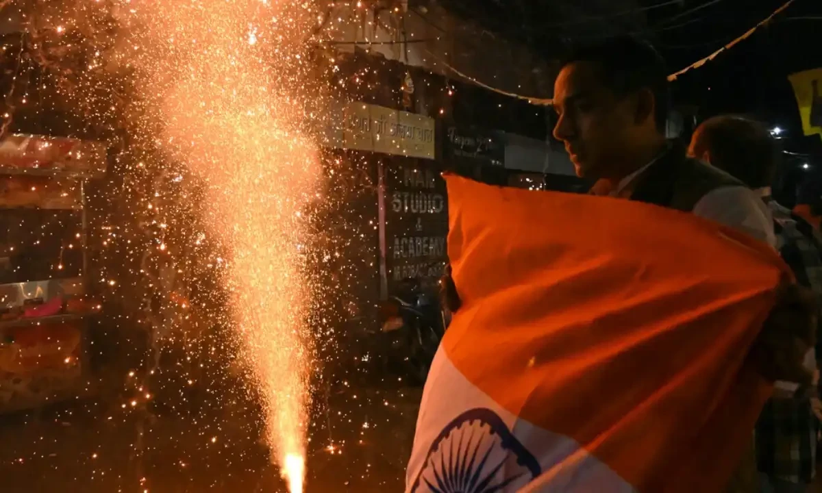 An India cricket fan holds the national flag of India as fans celebrate India’s victory in the ICC Champions Trophy one-day international (ODI) final cricket match between India and New Zealand on a street in Amritsar, Punjab, on March 9, 2025. AFP An India cricket fan holds the national flag of India as fans celebrate India’s victory in the ICC Champions Trophy one-day international (ODI) final cricket match between India and New Zealand on a street in Amritsar, Punjab, on March 9, 2025. AFP