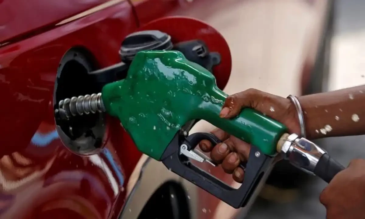A worker holds a nozzle to pump petrol into a vehicle at a fuel station in Mumbai, India, May 21, 2018. Reuters A worker holds a nozzle to pump petrol into a vehicle at a fuel station in Mumbai, India, May 21, 2018. Reuters