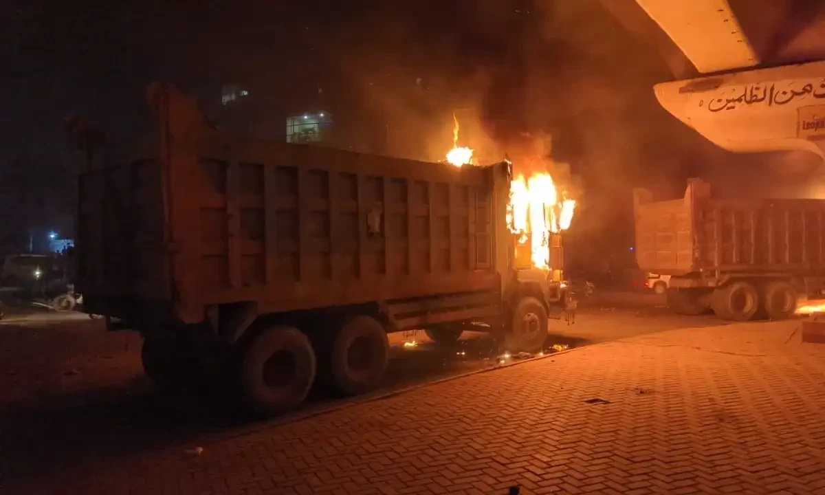 Trucks and tankers were set on fire. PHOTO AAJ NEWS Trucks and tankers were set on fire. PHOTO AAJ NEWS