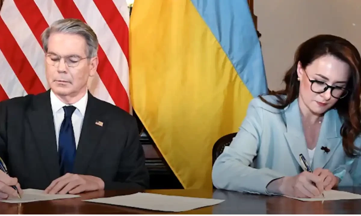 US Treasury Secretary Scott Bessent and Ukrainian First Deputy Prime Minister Yulia Svyrydenko shown signing the agreement. Reuters US Treasury Secretary Scott Bessent and Ukrainian First Deputy Prime Minister Yulia Svyrydenko shown signing the agreement. Reuters