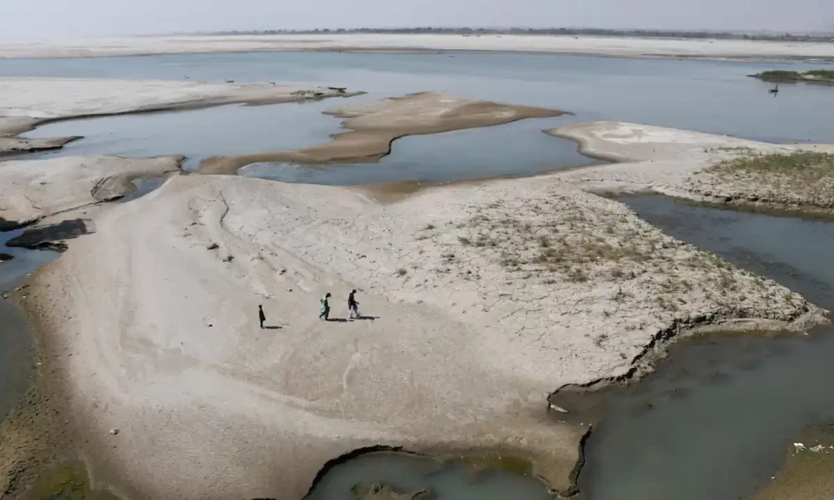 People walk on the dry patch of the Indus River, in Jamshoro, Pakistan on March 15, 2025. Reuters People walk on the dry patch of the Indus River, in Jamshoro, Pakistan on March 15, 2025. Reuters