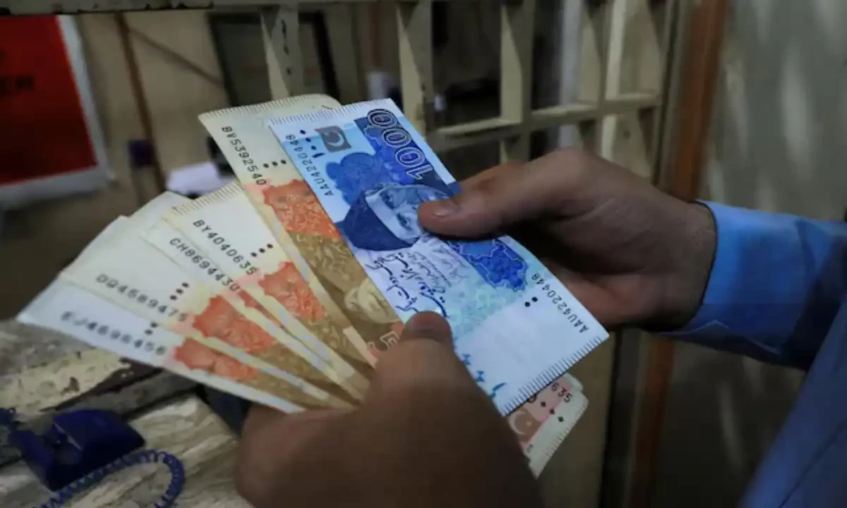 A man counts Pakistani rupee notes at a currency exchange shop in Peshawar, Pakistan September 12, 2023. Reuters A man counts Pakistani rupee notes at a currency exchange shop in Peshawar, Pakistan September 12, 2023. Reuters