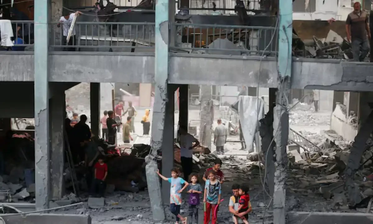 Palestinians inspect the damage at a school sheltering displaced people, following an Israeli strike, in Jabalia refugee camp, in the northern Gaza Strip, May 12, 2025. Reuters Palestinians inspect the damage at a school sheltering displaced people, following an Israeli strike, in Jabalia refugee camp, in the northern Gaza Strip, May 12, 2025. Reuters