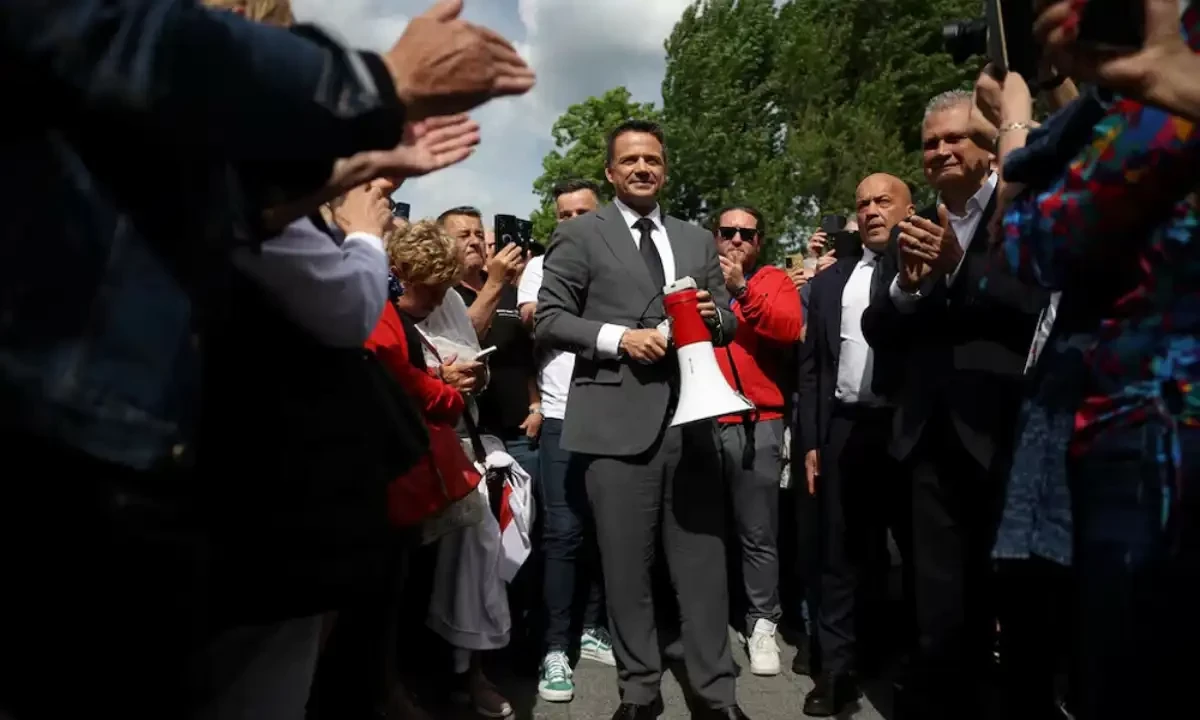 Civic Coalition presidential candidate, Warsaw Mayor Rafal Trzaskowski, holds a megaphone as he speaks to supporters during election meeting in Nowa Sol, Poland, May 14, 2025. REUTERS Civic Coalition presidential candidate, Warsaw Mayor Rafal Trzaskowski, holds a megaphone as he speaks to supporters during election meeting in Nowa Sol, Poland, May 14, 2025. REUTERS