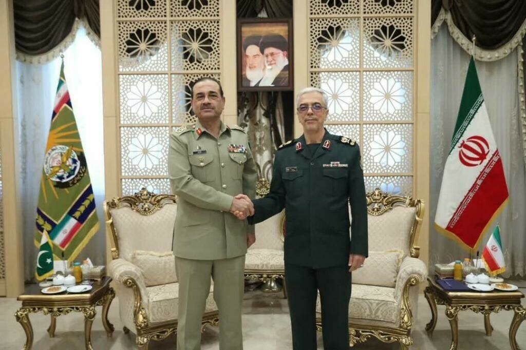 COAS Asim Munir greets Iranian Chief of General Staff Mohammad Bagheri. Photo via ISPR COAS Asim Munir greets Iranian Chief of General Staff Mohammad Bagheri. Photo via ISPR