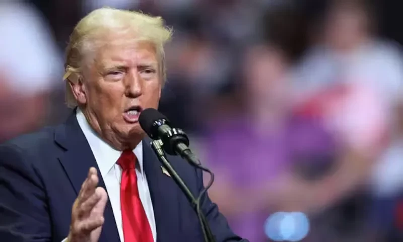 Republican presidential nominee and former U.S. President Donald Trump wears a flesh-colored bandage on his ear as he holds a campaign rally for the first time with his running mate, Republican vice presidential nominee U.S. Senator J.D. Vance (R-OH) in Grand Rapids, Michigan, U.S. July 20, 2024. Reuters Republican presidential nominee and former U.S. President Donald Trump wears a flesh-colored bandage on his ear as he holds a campaign rally for the first time with his running mate, Republican vice presidential nominee U.S. Senator J.D. Vance (R-OH) in Grand Rapids, Michigan, U.S. July 20, 2024. Reuters
