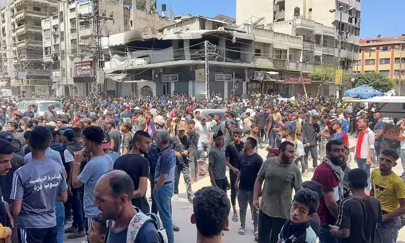 Palestinians wait to receive aid, in Gaza City, May 25, 2025. REUTERS Palestinians wait to receive aid, in Gaza City, May 25, 2025. REUTERS