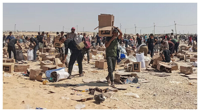 Palestinians gather to collect what remains of relief supplies from the distribution center of the U.S.-backed Gaza Humanitarian Foundation, in Rafah, in the southern Gaza Strip, June 5, 2025. REUTERS Palestinians gather to collect what remains of relief supplies from the distribution center of the U.S.-backed Gaza Humanitarian Foundation, in Rafah, in the southern Gaza Strip, June 5, 2025. REUTERS