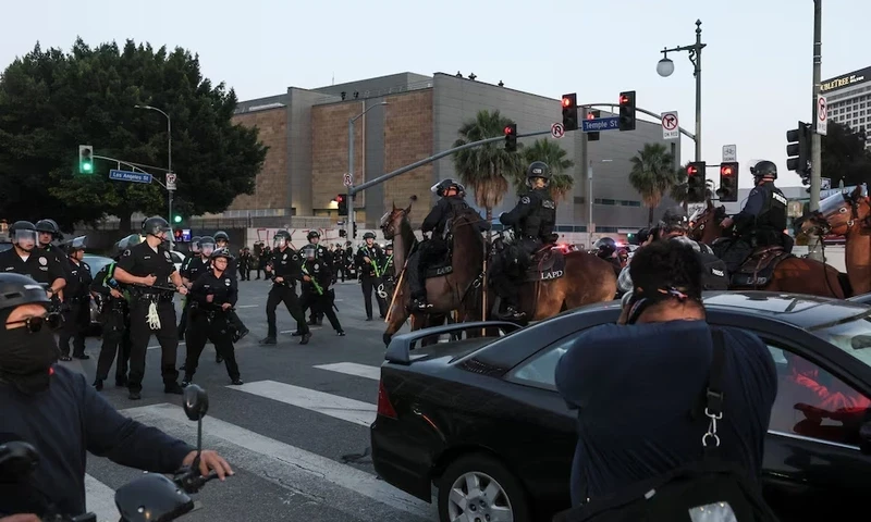 Members of law enforcement work to clear the area, as protests against federal immigration sweeps continue, in downtown Los Angeles, California, U.S. June 10, 2025. REUTERS Members of law enforcement work to clear the area, as protests against federal immigration sweeps continue, in downtown Los Angeles, California, U.S. June 10, 2025. REUTERS