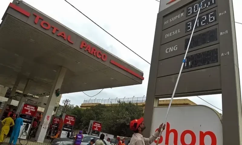 An employee updates the fuel prices at a fuel station in Karachi, Pakistan, on September 1, 2023. AFP An employee updates the fuel prices at a fuel station in Karachi, Pakistan, on September 1, 2023. AFP