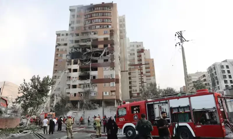 Firefighters work at the scene of a damaged building in the aftermath of Israeli strikes, in Tehran, Iran, June 13, 2025. Reuters Firefighters work at the scene of a damaged building in the aftermath of Israeli strikes, in Tehran, Iran, June 13, 2025. Reuters