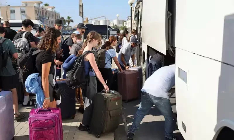 Passengers from the Crown Iris, a cruise ship, board buses at the port of Larnaca, Cyprus, June 18, 2025. Reuters Passengers from the Crown Iris, a cruise ship, board buses at the port of Larnaca, Cyprus, June 18, 2025. Reuters
