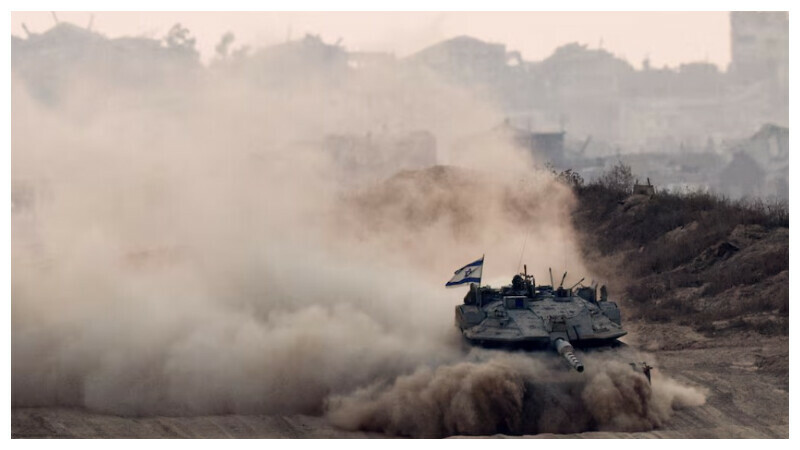An Israeli tank manoeuvres in Gaza, as seen from the Israeli side of the border, June 17, 2025. REUTERS An Israeli tank manoeuvres in Gaza, as seen from the Israeli side of the border, June 17, 2025. REUTERS