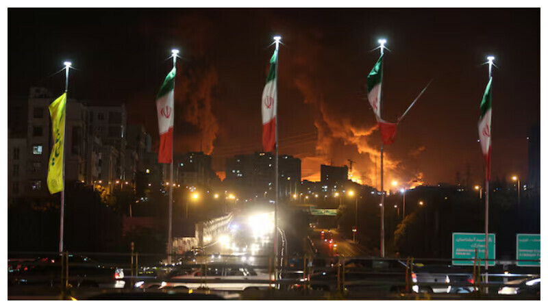 Fire of Israeli attack on Sharan Oil depot is seen following the Israeli strikes on Iran, in Tehran, Iran, June 15, 2025. Majid Asgaripour/WANA (West Asia News Agency) via REUTERS