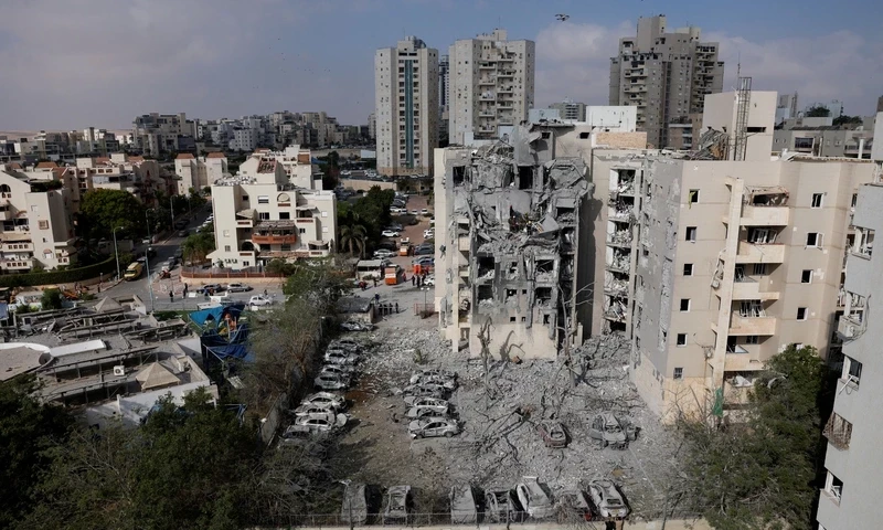 Rescuers and security personnel work at the impacted site after a missile attack from Iran, amid the Iran-Israel conflict in Tel Aviv, Israel June 22, 2025. REUTERS Rescuers and security personnel work at the impacted site after a missile attack from Iran, amid the Iran-Israel conflict in Tel Aviv, Israel June 22, 2025. REUTERS