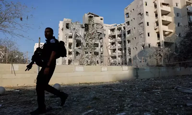 A member of the security forces walks past an impacted residential site, following a missile attack from Iran on Israel, amid the Israel-Iran conflict in Be’er Sheva, Israel June 24, 2025. REUTERS A member of the security forces walks past an impacted residential site, following a missile attack from Iran on Israel, amid the Israel-Iran conflict in Be’er Sheva, Israel June 24, 2025. REUTERS