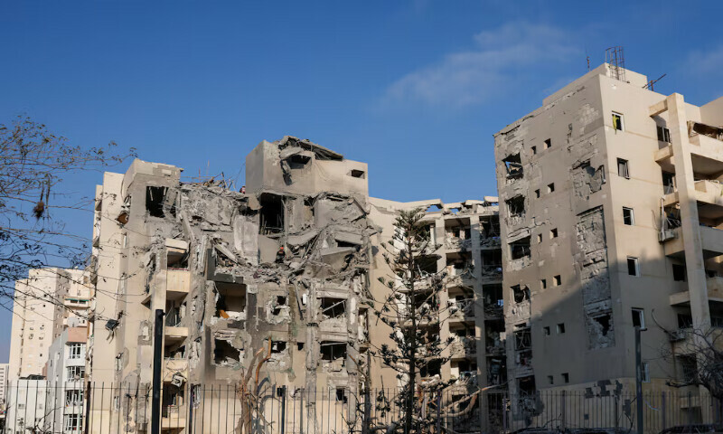 Emergency personnel work at a residential site following a missile attack from Iran in Be’er Sheva, Israel, on Tuesday. 00 Reuters Emergency personnel work at a residential site following a missile attack from Iran in Be’er Sheva, Israel, on Tuesday. 00 Reuters