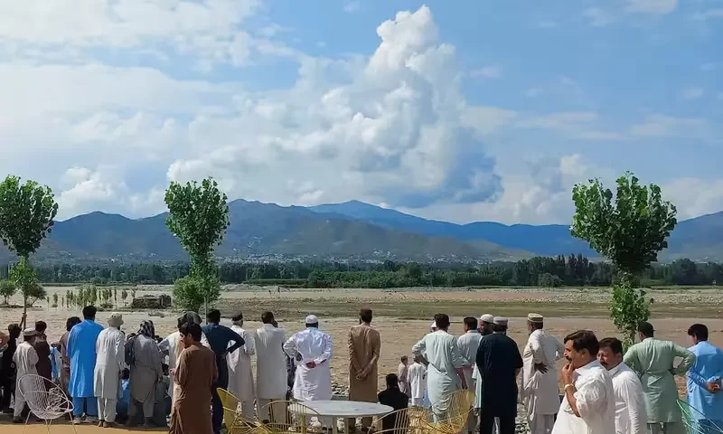 Residents gather, after tourists, who were on a picnic, were swept away by overflowing floodwaters in the Swat River, in Swat Valley in Pakistan June 27, 2025. Reuters
