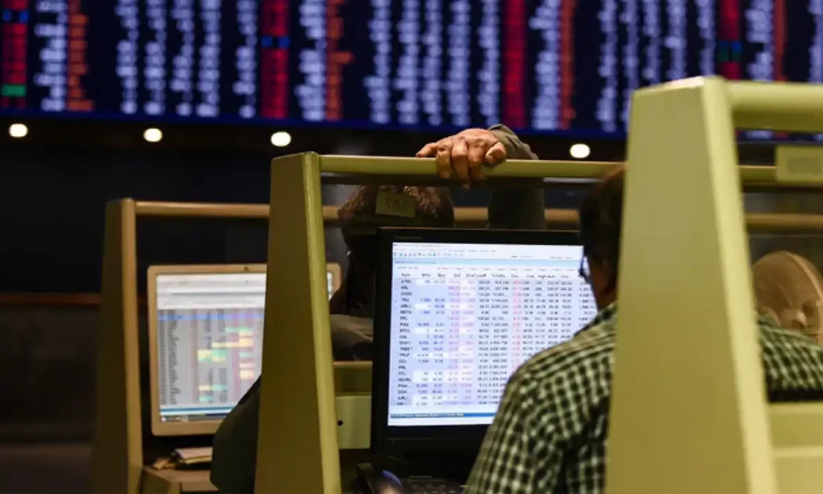 Stock brokers monitor share prices on computers during a trading session at the Pakistan Stock Exchange in Karachi on February 12, 2024. AFP/File