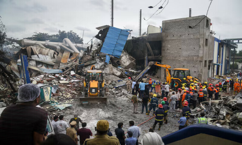 Rescue workers look for survivors after an explosion and fire at a chemical factory in Sangareddy in the southern state of Telangana, India. – Reuters