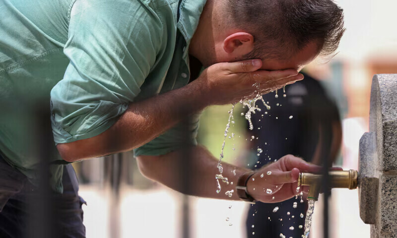 A man cools off at a fountain at Retiro park during a heatwave, in Madrid, Spain, on Tuesday. – Reuters A man cools off at a fountain at Retiro park during a heatwave, in Madrid, Spain, on Tuesday. – Reuters
