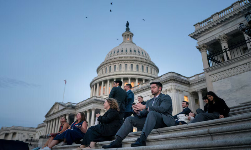 Senate staffers rest on the US Capitol steps at sunrise as Republican lawmakers struggle to pass President Donald Trump’s sweeping spending and tax bill in Washington, DC. – Reuters Senate staffers rest on the US Capitol steps at sunrise as Republican lawmakers struggle to pass President Donald Trump’s sweeping spending and tax bill in Washington, DC. – Reuters