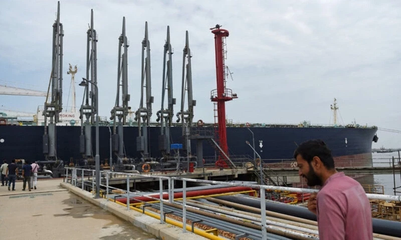 A man walks past a Russian cargo ship carrying crude oil docked at the Karachi port in Karachi on June 28, 2023. AFP A man walks past a Russian cargo ship carrying crude oil docked at the Karachi port in Karachi on June 28, 2023. AFP