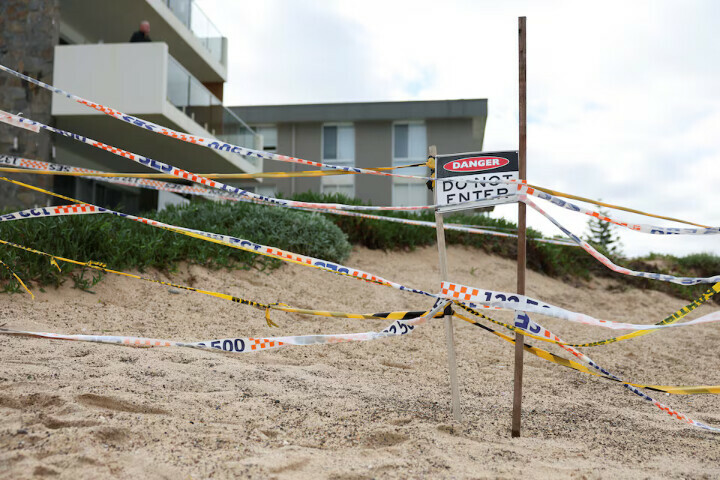 A Do Not Enter sign is seen near residential properties that were evacuated due to the threat of beach erosion from a storm, in The Entrance, Australia, on Wednesday. – Reuters A Do Not Enter sign is seen near residential properties that were evacuated due to the threat of beach erosion from a storm, in The Entrance, Australia, on Wednesday. – Reuters