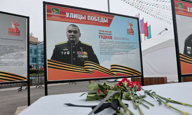 A view shows flowers placed in front of a board with a photograph of Major-General Mikhail Gudkov, the deputy head of the Russian Navy who was recently killed in the Kursk region at an exhibition of distinguished Russian soldiers’ portraits in the far eastern city of Vladivostok, Russia, on Thursday. – Reuters A view shows flowers placed in front of a board with a photograph of Major-General Mikhail Gudkov, the deputy head of the Russian Navy who was recently killed in the Kursk region at an exhibition of distinguished Russian soldiers’ portraits in the far eastern city of Vladivostok, Russia, on Thursday. – Reuters