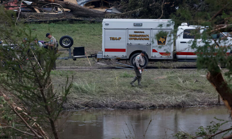 Members from Texas Game Wardens of the Law Enforcement Divison work following flash flooding, in Kerrville, Texas. – Reuters Members from Texas Game Wardens of the Law Enforcement Divison work following flash flooding, in Kerrville, Texas. – Reuters